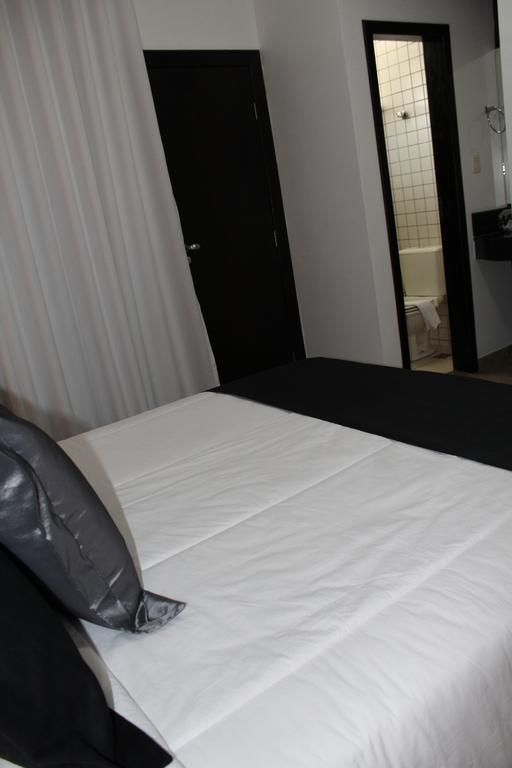 Hotel Dom Henrique Timóteo Екстериор снимка